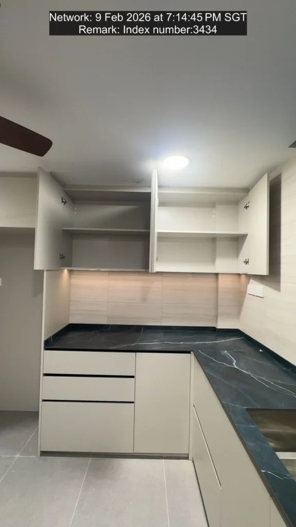 Tse7en kitchen wall cabinet with open doors above black countertop