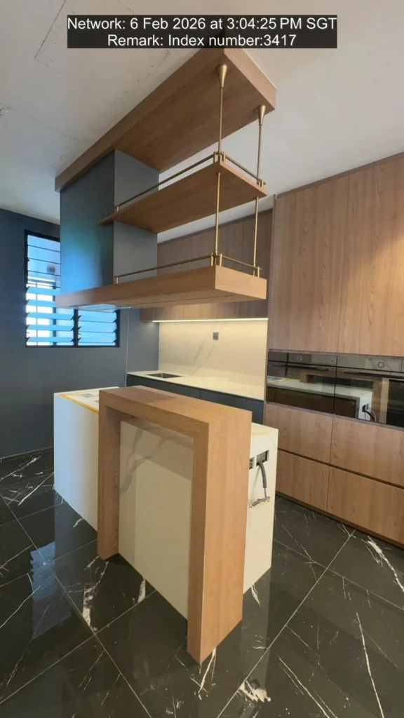Tse7en modern kitchen with floating wood shelves, white island, gray cabinets and marble floor