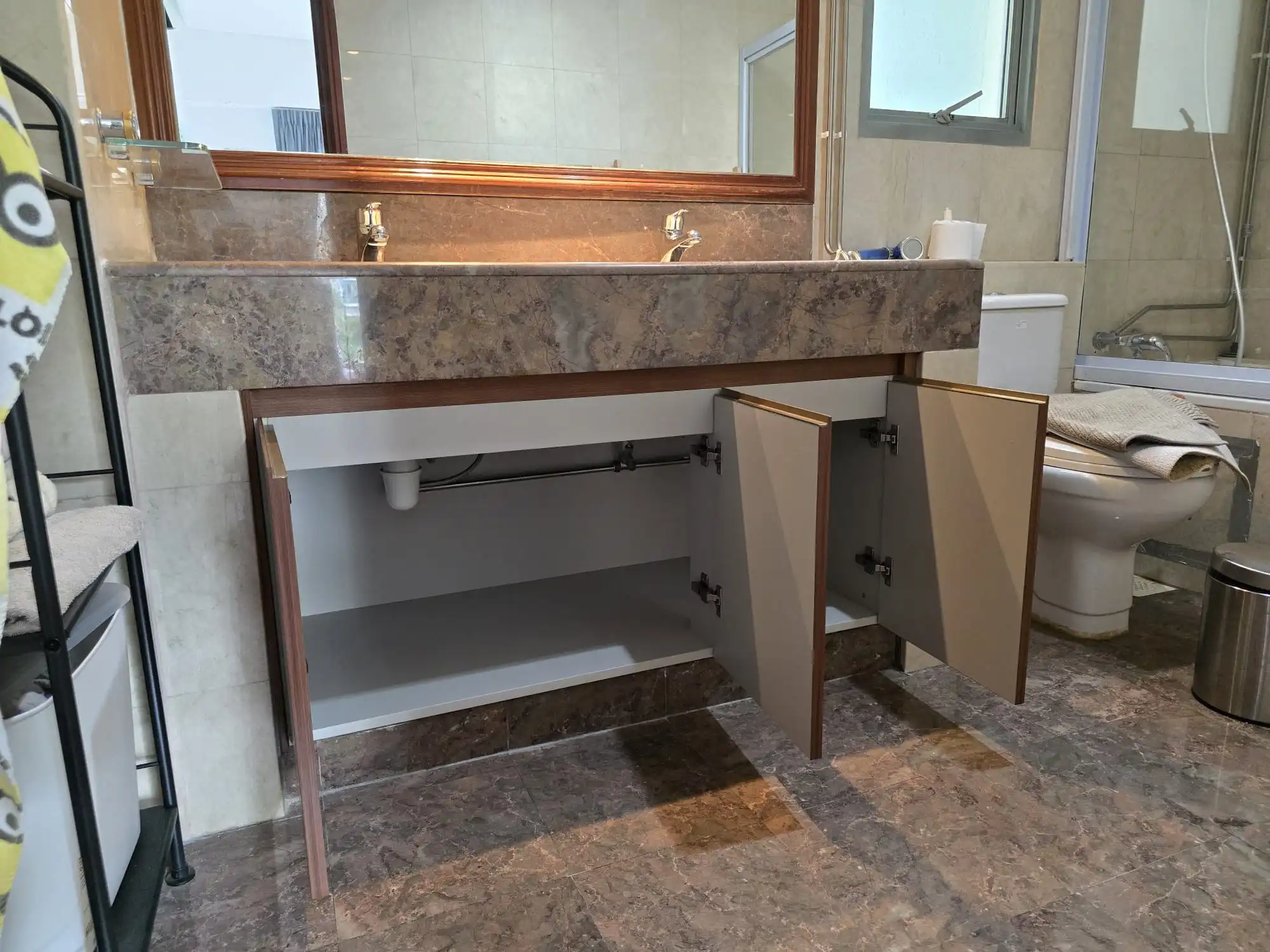 bathroom vanity cabinet installation during full home renovation in Singapore