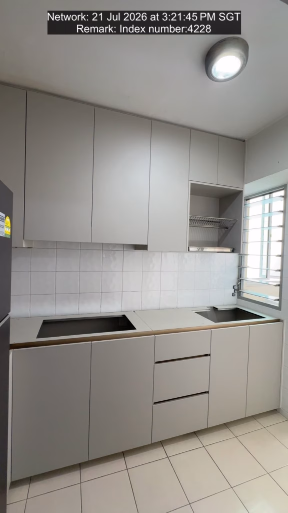 Modern custom kitchen cabinets with quartz countertop, integrated sink and wall storage by T Se7en Singapore