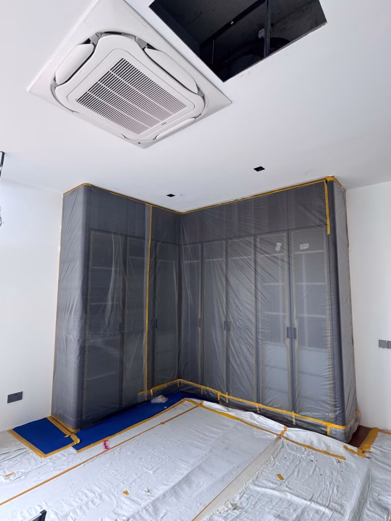 L-Shaped Walk-in Wardrobe Installation in Progress | T Se7en Singapore